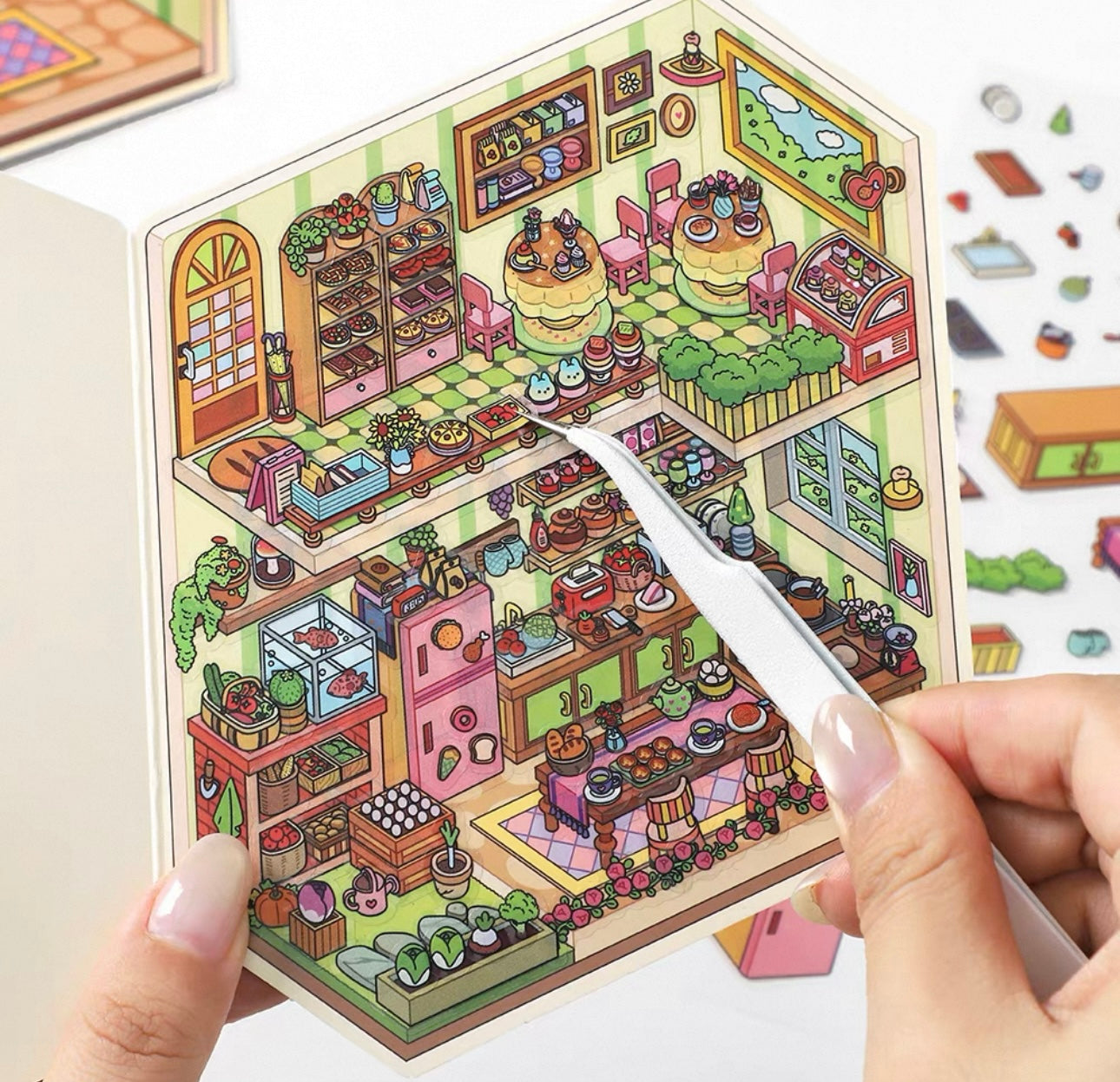 Today's business includes flip-style scenery stickers and miniature scenes