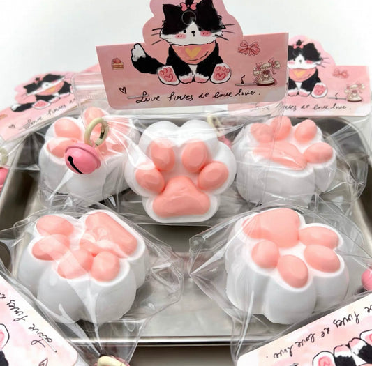 Squeeze the happy little cat paw