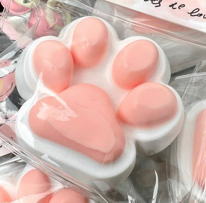 Squeeze the happy little cat paw