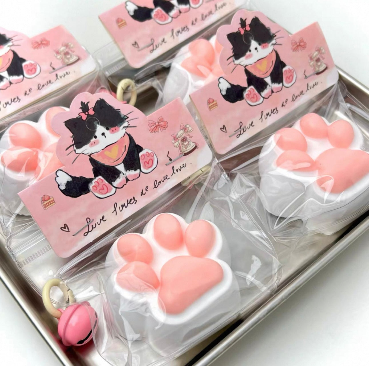 Squeeze the happy little cat paw